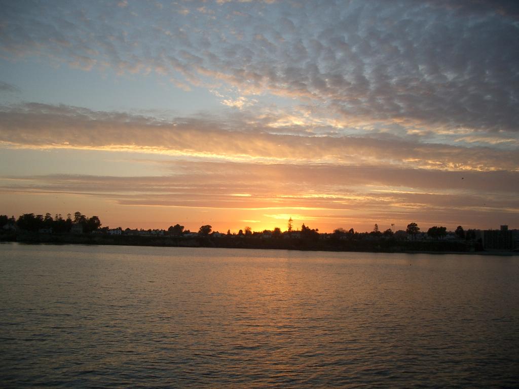 Drinking Margheritas on the pier looking back at Santa Cruz