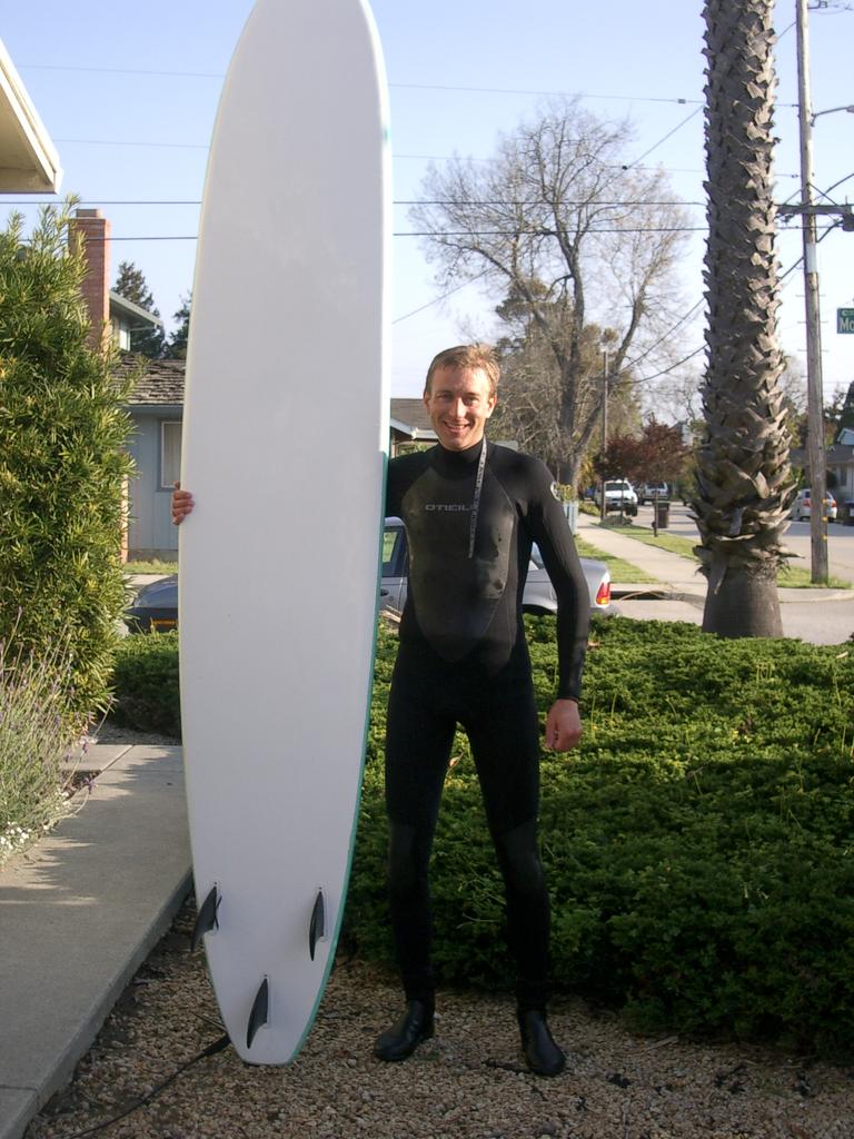 Jim with the world's largest surf board