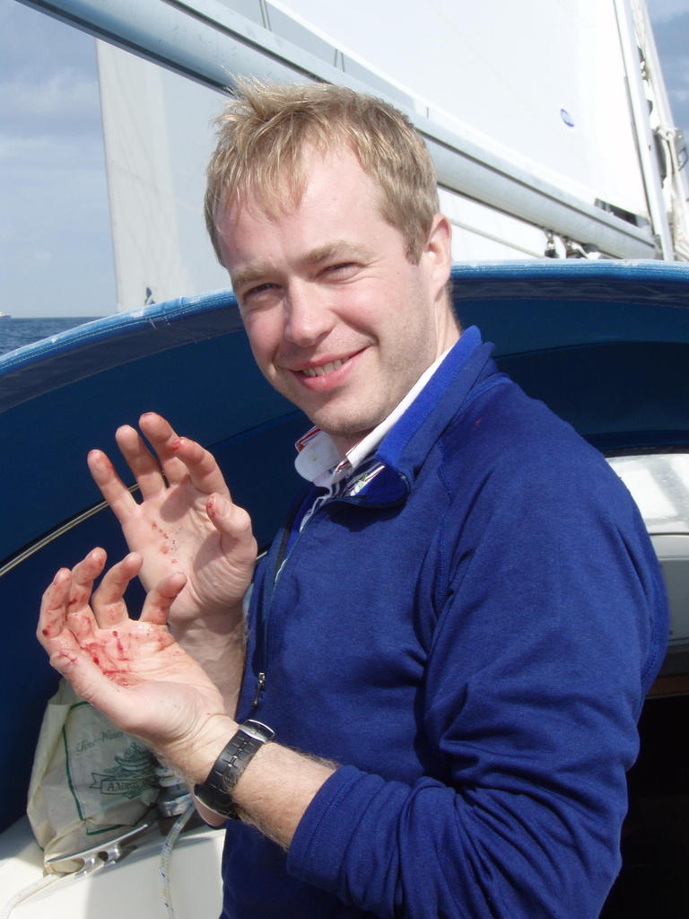 Mark covered in fish blood